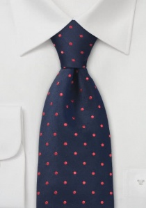 Cravate bleu marine à pois rouge vif
