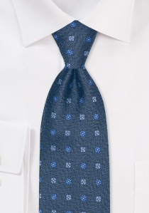 Cravate en soie motif floral bleu denim moucheté