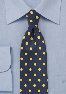 Cravate bleu foncé aux larges pois jaune doré