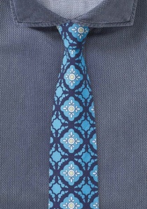 Cravate homme turquoise aux emblèmes classiques